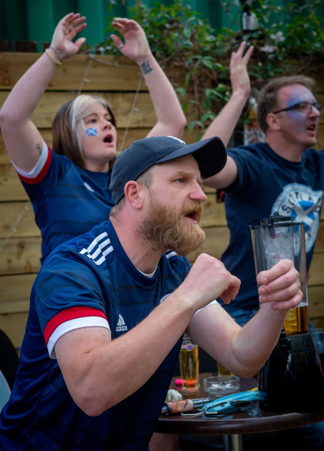 Scotland fans in the Innes Bar watching the Euro 2020 game against Czech Republic..Fans during the game..Picture: Callum Mackay..